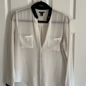 White bottom down with black and gold collar